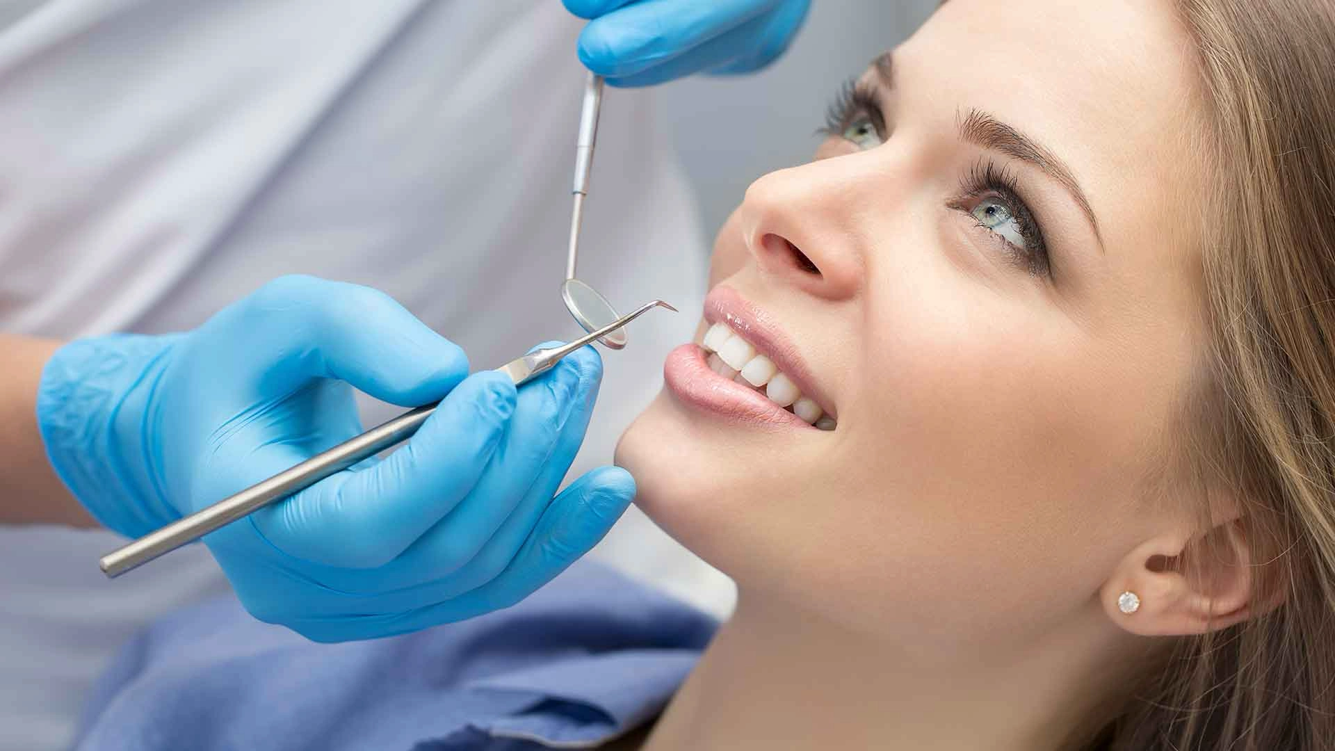 dentist examining patient