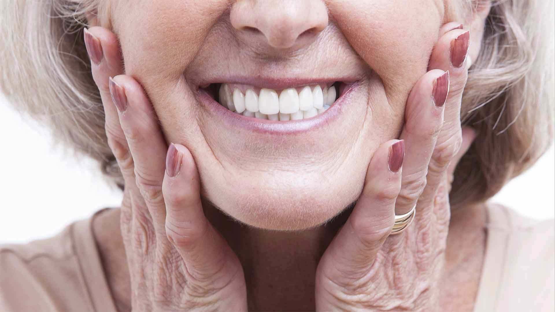 female-smiling-after-dentures