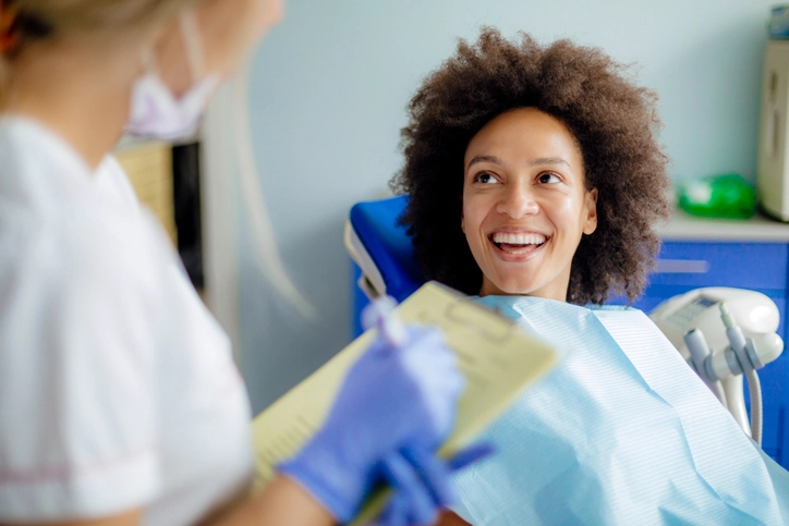 woman smiling in dentist chair